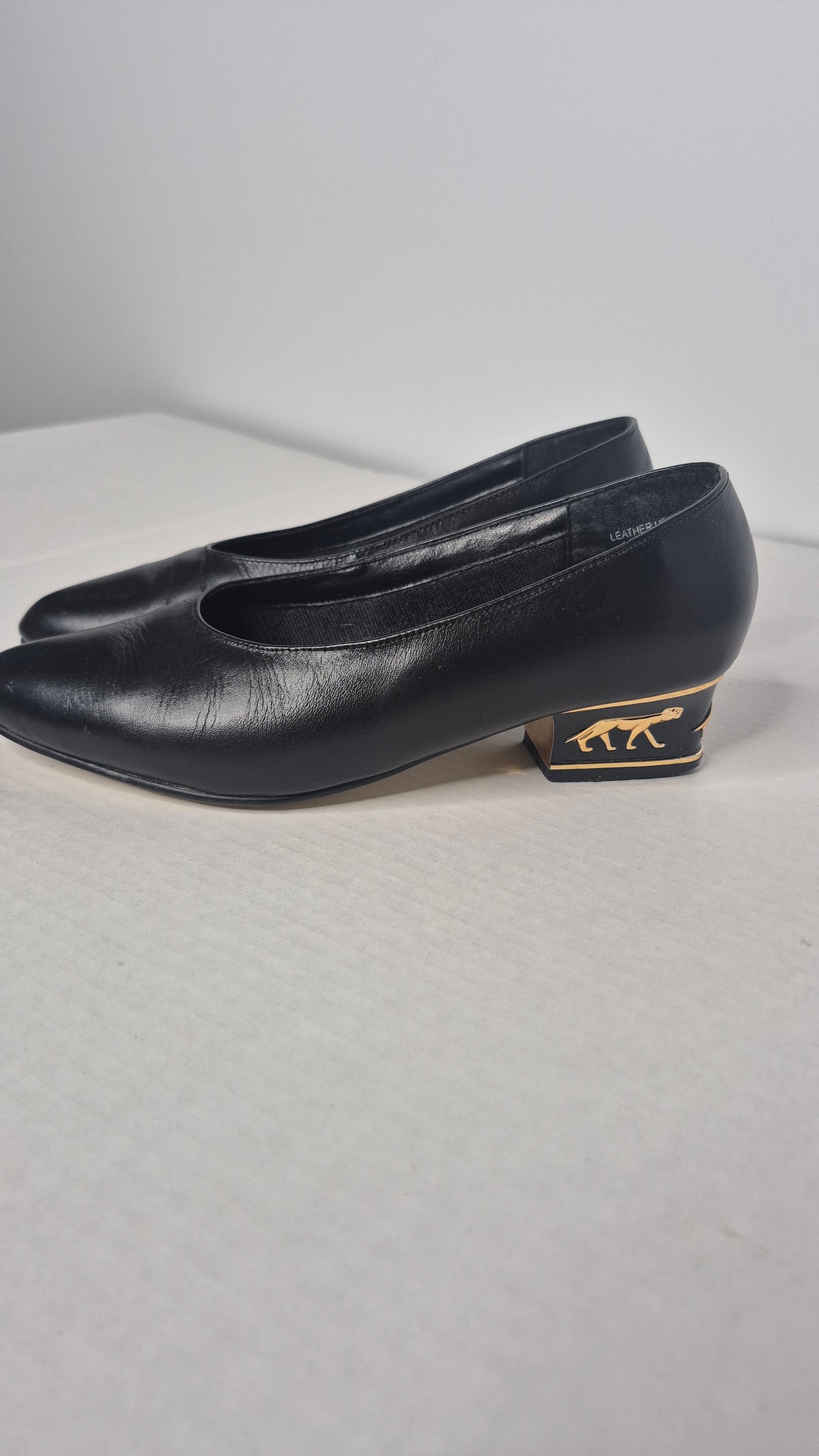 1990s Classique Black Sculpted Gold Panther Low Block Heel Pumps Size 6 WW Wide